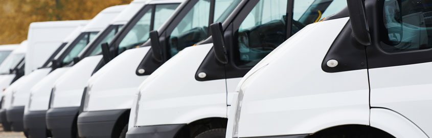 Fleet of White Commercial Vans